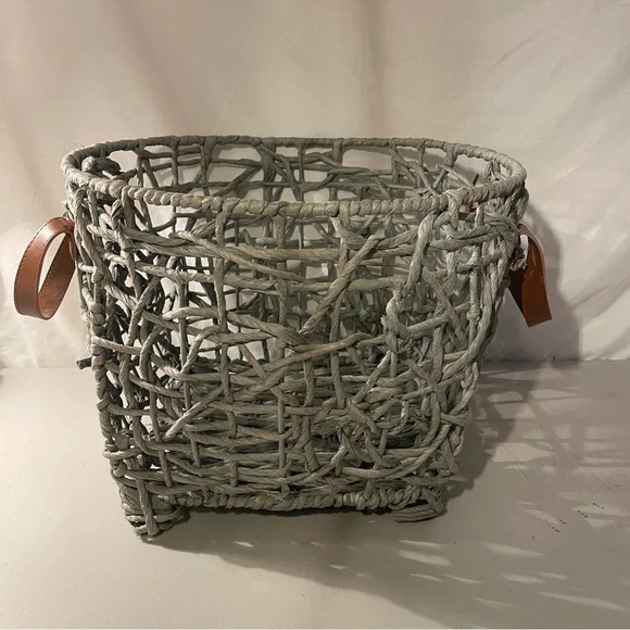 Woven gray Basket with brown Leather Handles width 14” deep 11” 4 metal feet