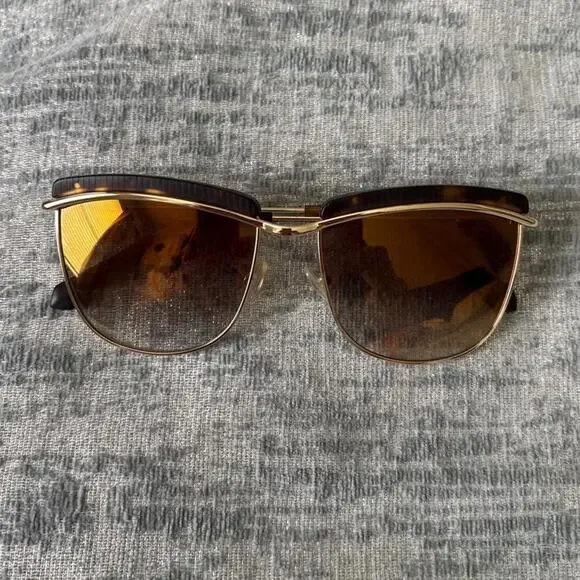 Brown tortoiseshell sunglasses with gold