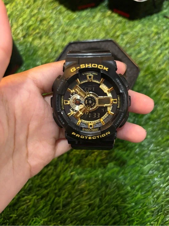 G-Shock Men’s Black and Gold Watch