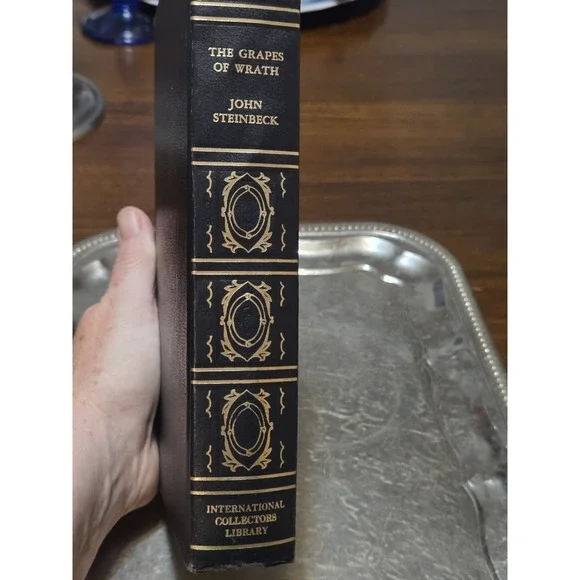 vintage leatherette-bound edition of The Grapes of Wrath by John Steinbeck 1967