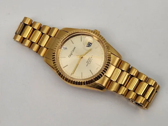 Oleg Cassini 31-727DG Diamond Gold Tone 100 FT WR Quartz Watch