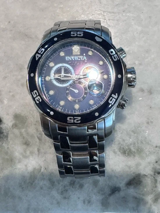 Invicta Silver Stainless Steel Watch with Black Bezel and Dark Dial