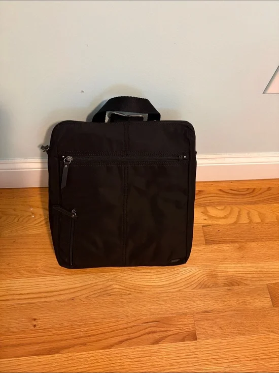 NWT The  Sak Esperato Nylon Backpack in Black can be used by anyone.