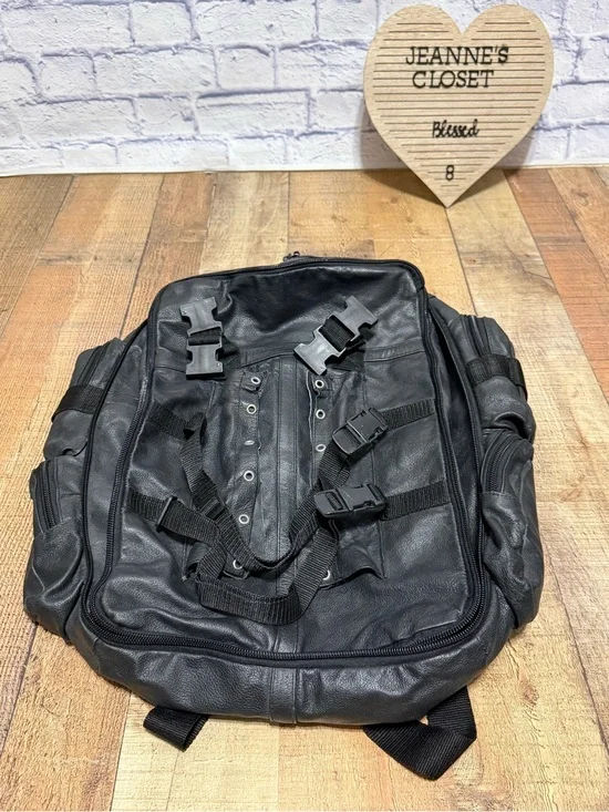 Heavy Duty Black Leather Motorcycle Backpack  Pre owned good condition.. there i