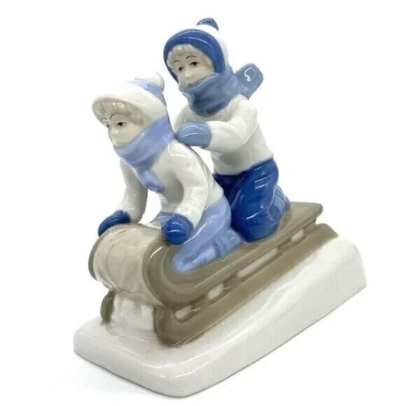 Paul Sebastian Children Sledding Porcelain Figurine Collectable