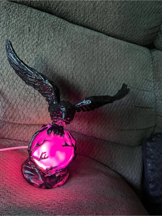 Sculpted Black Eagle Lantern with Pink Glow