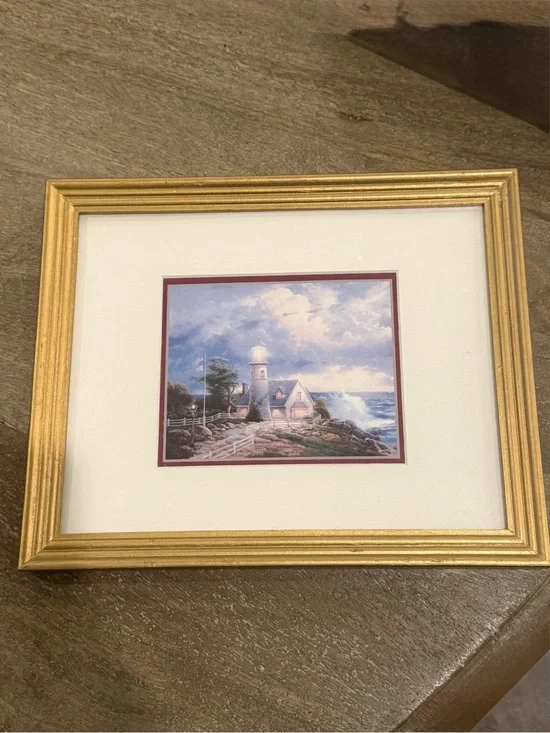 Thomas Kinkade Gold Framed Lighthouse Print with Blue Sky and White Clouds