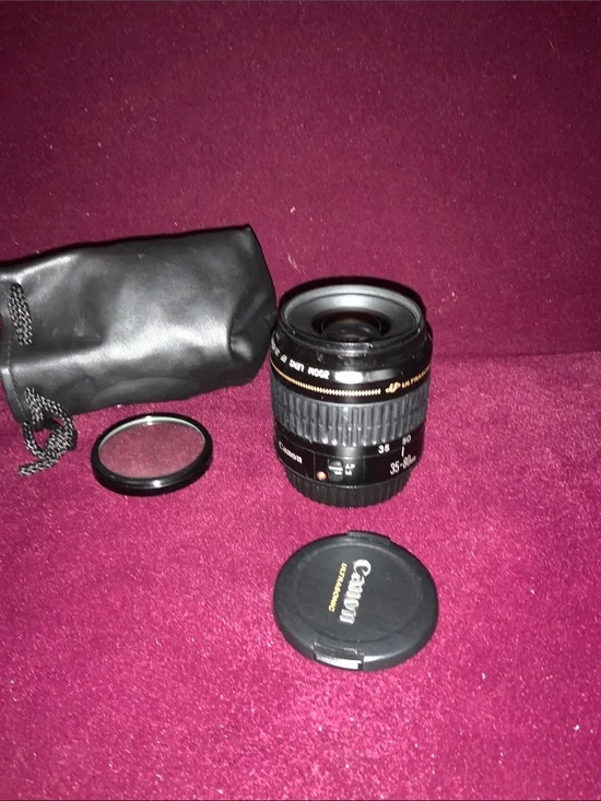 Canon EF 35-80mm F/4-5.6 Lens with lens covers & pouch. Good  working condition.