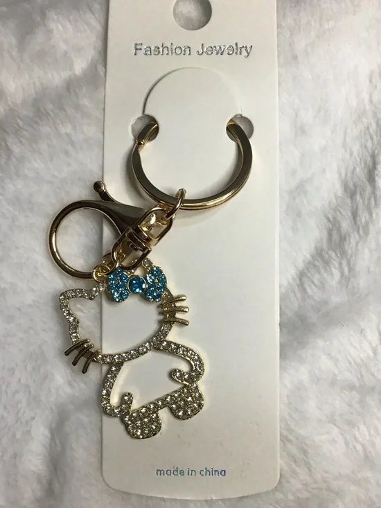 Gold-tone Crystal Cat Keychain with Blue Bow