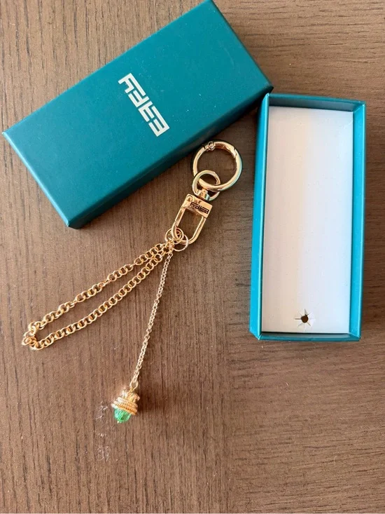 Effy Bell bag charm Gold-Tone Keychain with Green Stone bell Charm NEW IN BOX