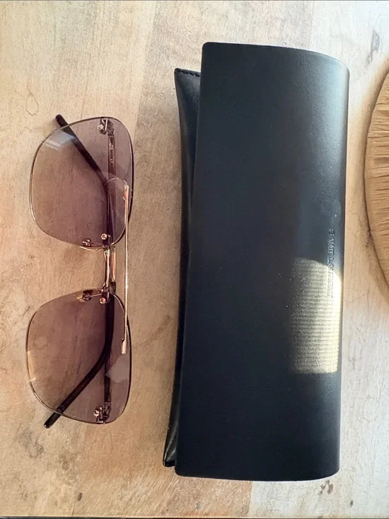 Saint Laurent Rimless women’s Sunglasses with Brown Lenses and Black Case