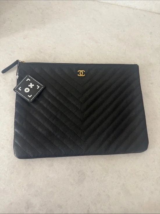 CHANEL Black Chevron Quilted Leather Zip Pouch with Gold CC