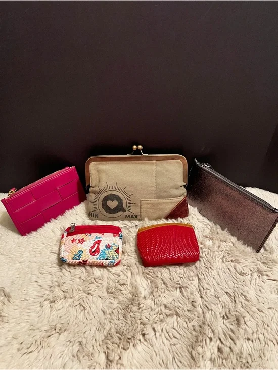Bundle of various bags. Wallets, change purses