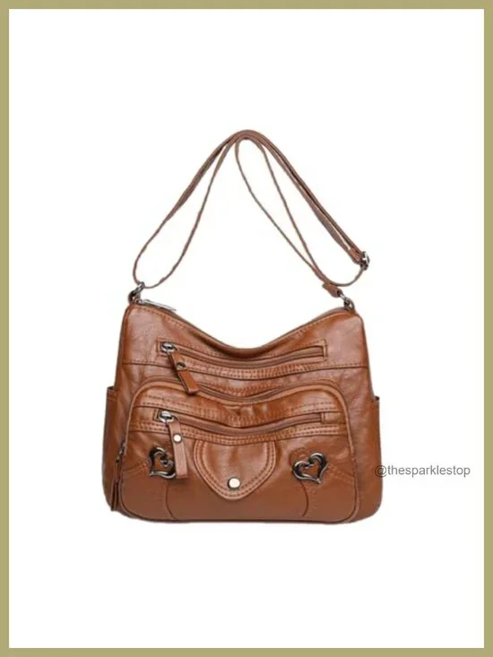 Faux Leather Tassel Crossbody Bag with Adjustable Strap and Multiple Pockets