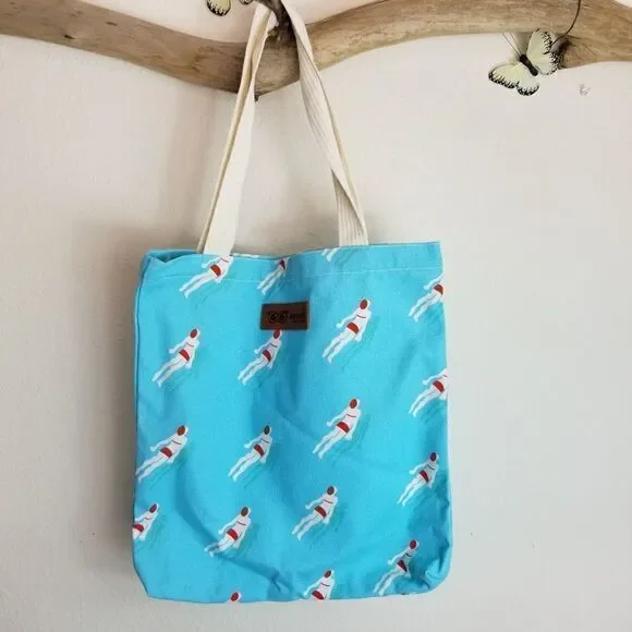Blue tote bag with vintage swimmer print
