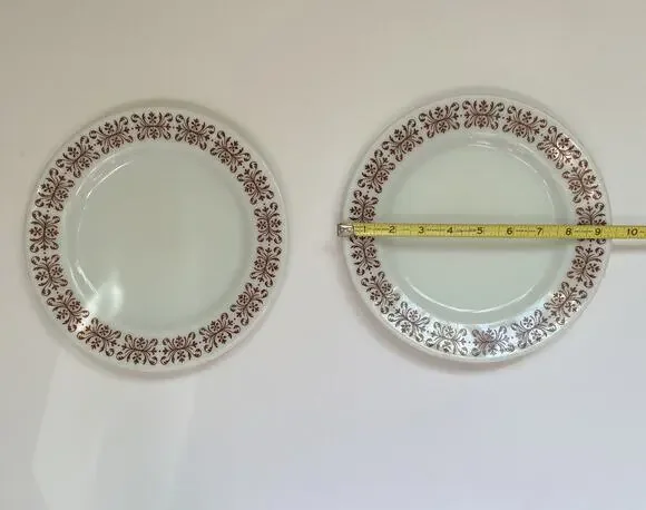 Vintage Pyrex Copper Filigree 9.5” plates Made In USA Two Plates For Price Shown