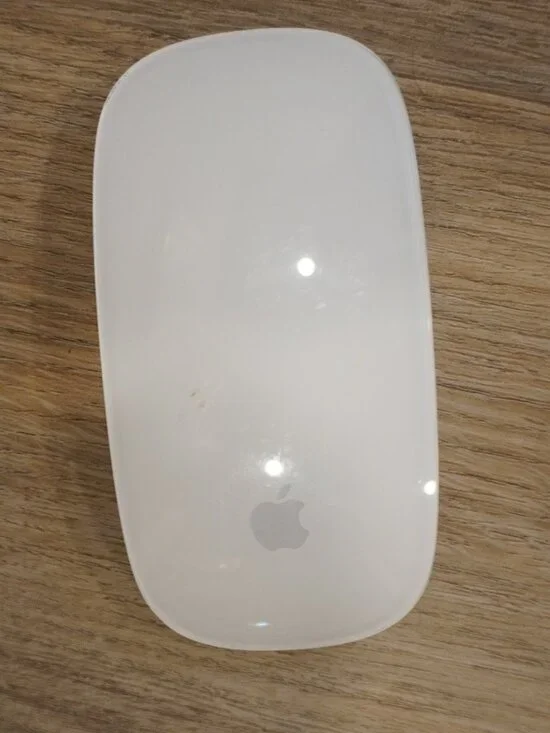 Chargeable Apple Wireless Magic Mouse in White and Silver with Black Feet