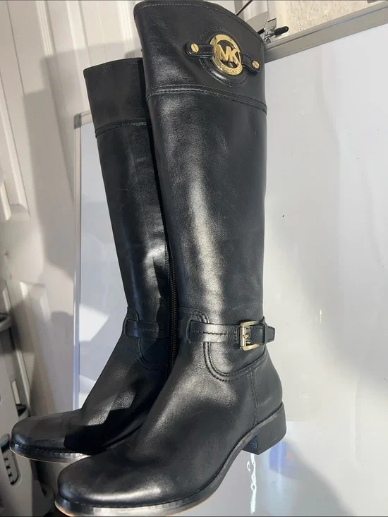 Knee-high leather boots with MK logo