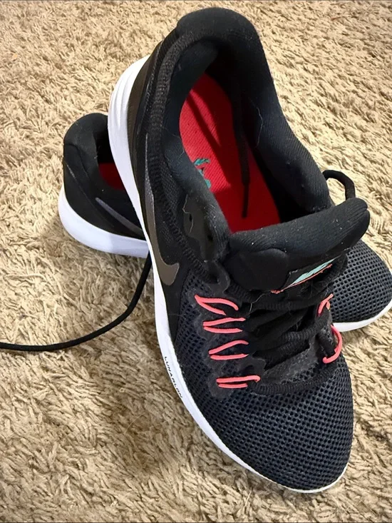 Nike Black Running Shoes with Pink and White Accents