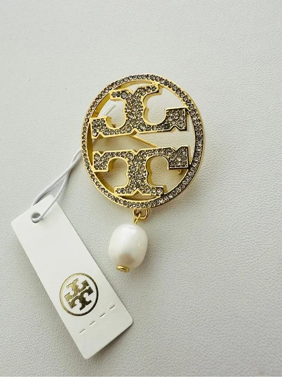 Tory Burch Gold-Tone Crystal Logo Brooch with White Pearl Drop