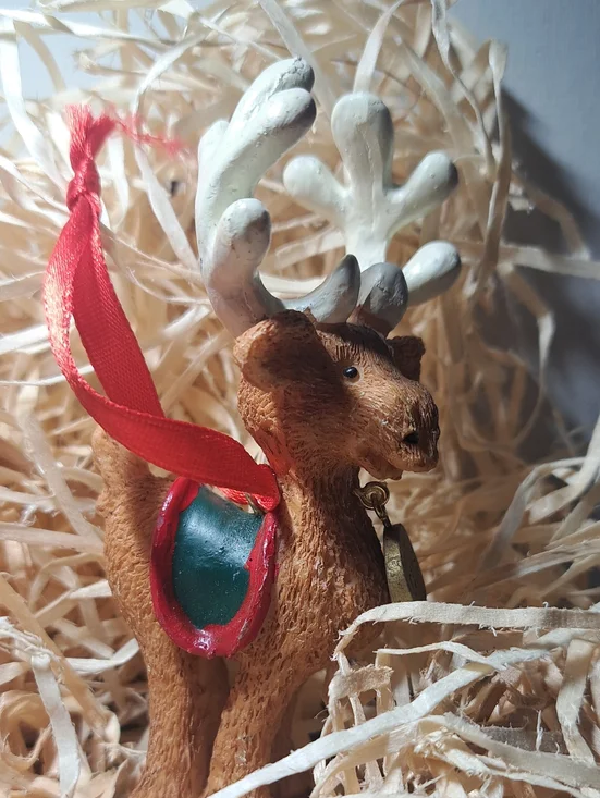 Festive Comet Brown Reindeer Ornament with Red Ribbon