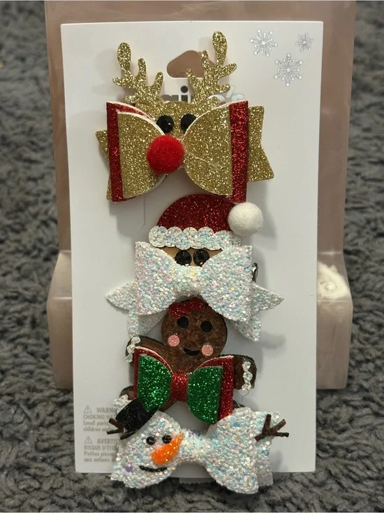 NWT Claire’s set of 4 hair clips - 1 reindeer, 1 Santa, 1 gingerbread man