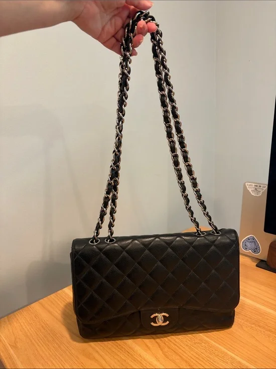 Pre-Loved CHANEL Black Caviar Leather Jumbo Single Flap with Silver Hardware