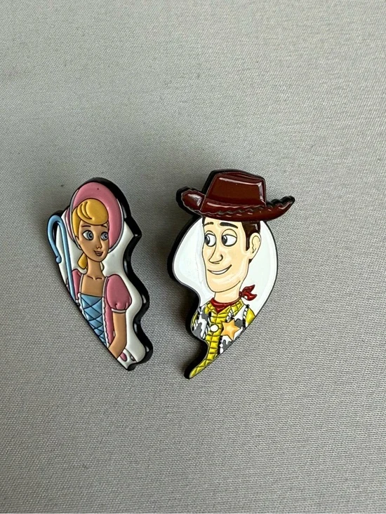 Toy Story Woody and Bo Peep split heart enamel pin set