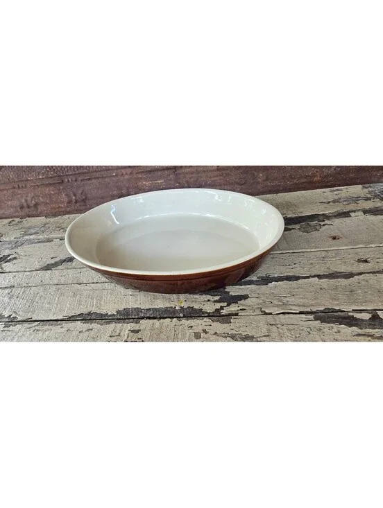 Vintage Ceramic oval baking dish with brown exterior and cream interior