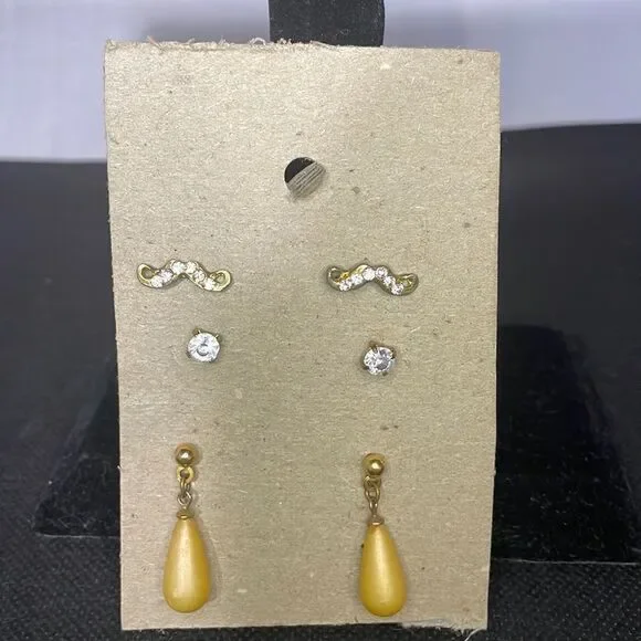 Three sets of earrings