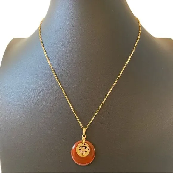 Delicate Looking Vintage Pendant on Shimmering Gold Tone Chain.