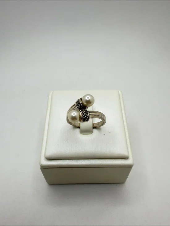 Sterling‎ silver stamped, faux pearl and marcasite bypass ring!
