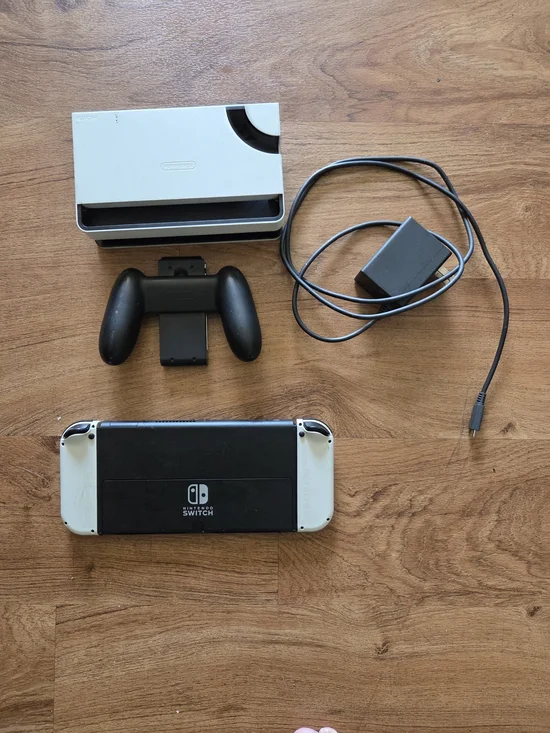 Nintendo Switch with White Joy‑Con Panels and Black Back