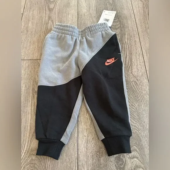 Nike Kids' Black and Gray Joggers with Red Logo