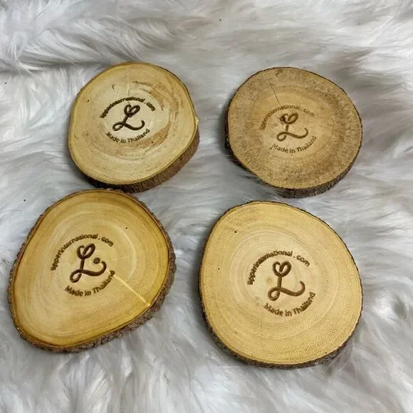 Lipper International Acacia Tree Barks set of four coasters .