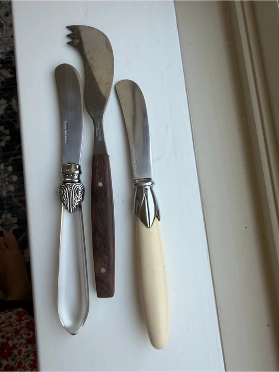 Assorted Cheese Spreaders - Ivory, Wood, and Silver Handles