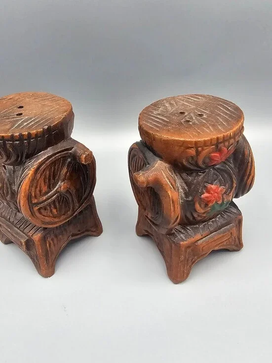 Vintage Hand-Carved Wooden Salt and Pepper Shakers with Floral Design
