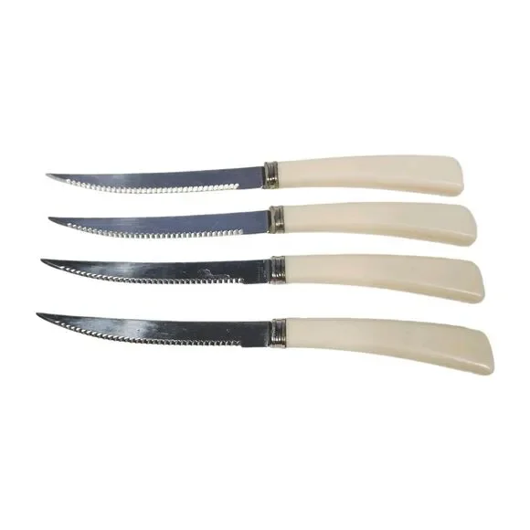 Vintage Quikut Steak Knives Set Of 4 Cream Ivory Handle Serrated USA MCM