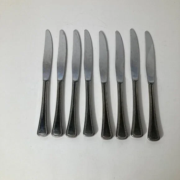 8- Oneida Stainless Flatware Knives 9