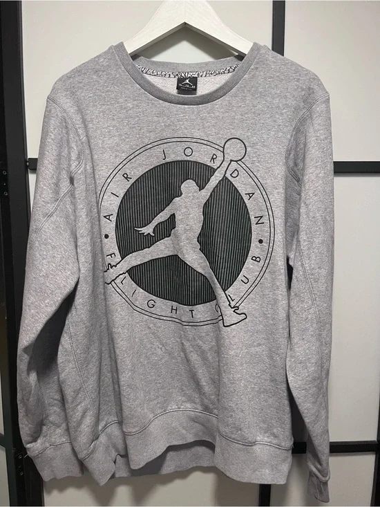 Classic Nike Air Jordan Flight Club crewneck sweatshirt in heather gray. Feature