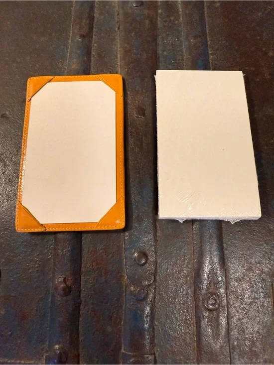 Yellow leather Dooney & Bourke note holder