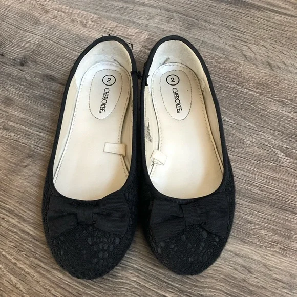 Black flats.