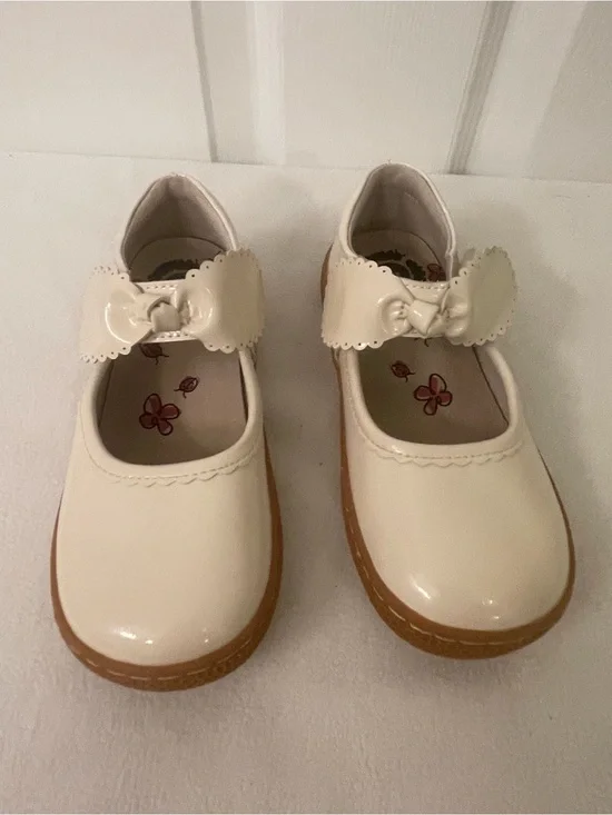Livie & Luca Cream Patent Mary Jane Shoes with Bow Strap