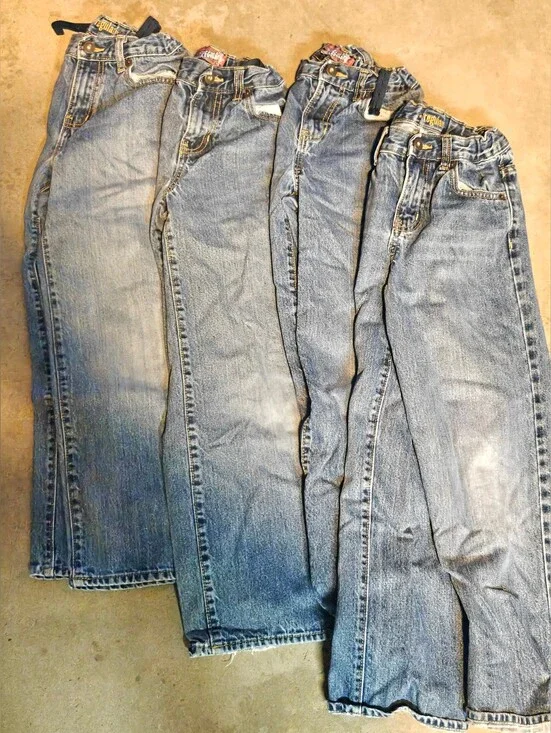 4 pair of Old Navy boys' jeans in size 10 regular. These blue jeans are designed