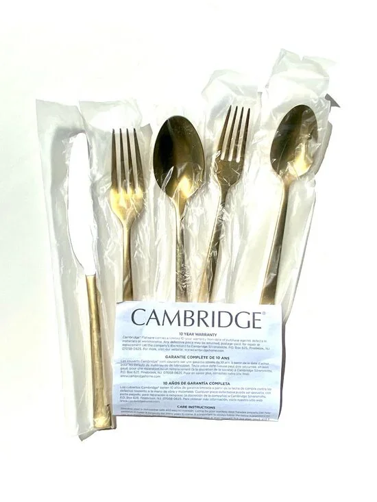 Crate&Barrel gold flatware “Ellenore” by Cambridge. 4 place settings, NIB.