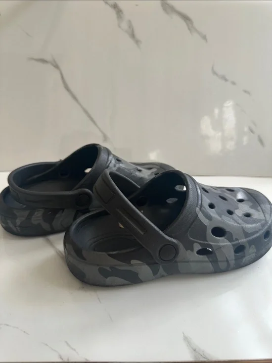 CROCS USED but still Good (has a hole but will be patched)
