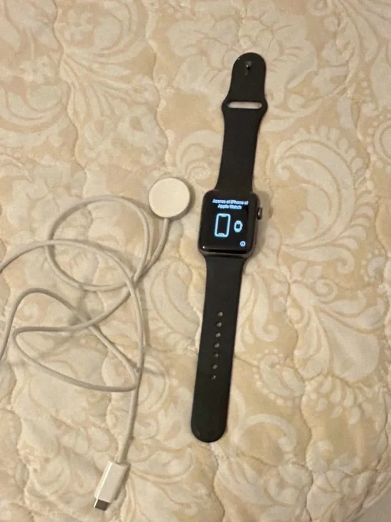 Apple Watch with black Silicone Band and Magnetic Charger. Used