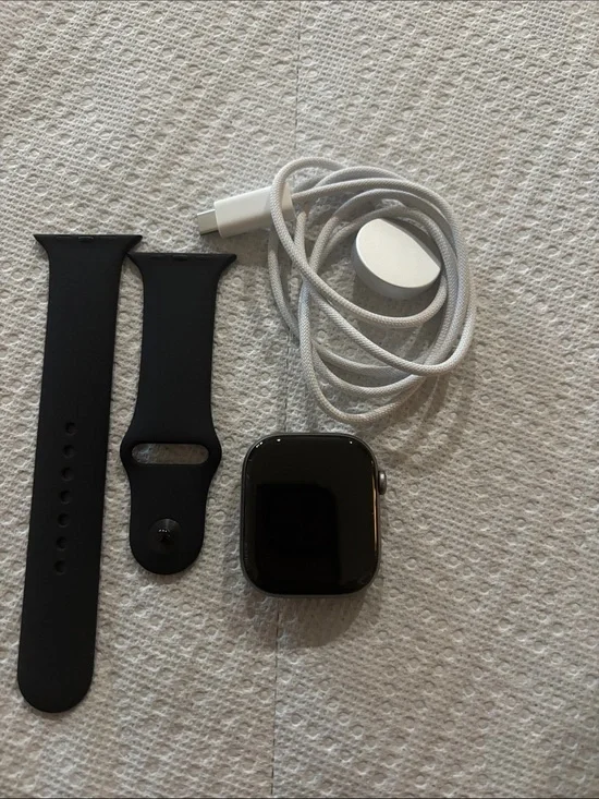 Apple Black and grey Smartwatch with Black Sport Band and White Charger Cable