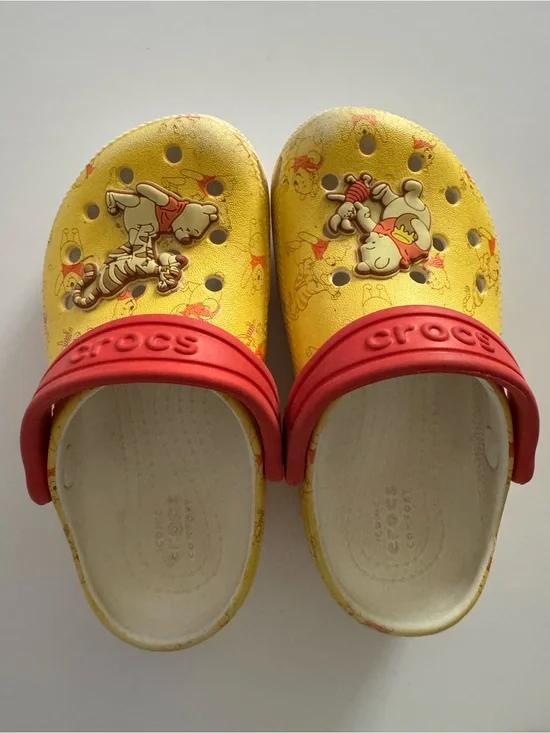 CROCS Kids Yellow Clogs with Red Heel Straps - Winnie the Pooh Theme