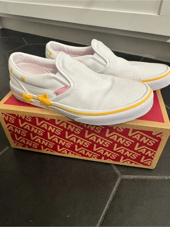 Vans Kids White Slip-On Sneakers with Yellow Star Accents